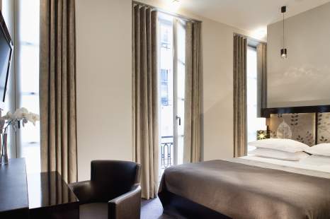 
                        Foto quarto Hotel Caron Paris
                    