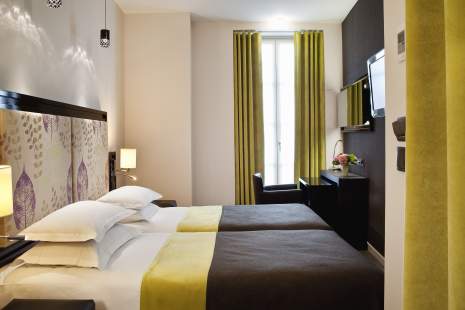 
                        Foto quarto twin Hotel Caron Paris
                    